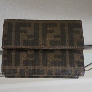 AUTHENTIC Fendi Logo Brown Canvas Trifold Wallet With Purple Interior